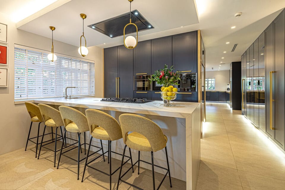 Spacious double kitchen designed for private chefs and seamless event hosting