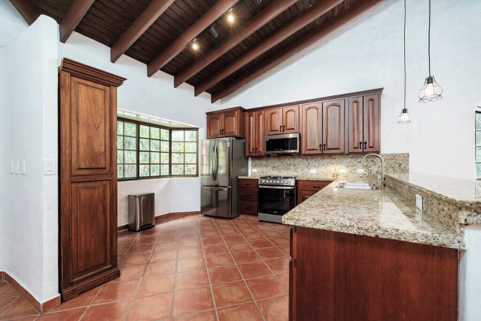 Cook in style with granite counters, stainless appliances, and all essentials.