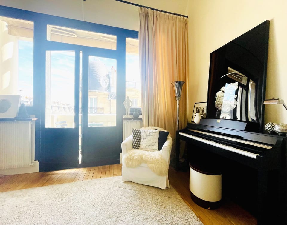 Living room, piano area