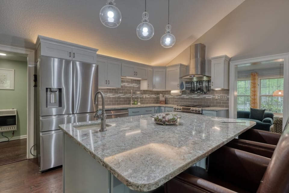 Modern kitchen and a spacious island for gathering.