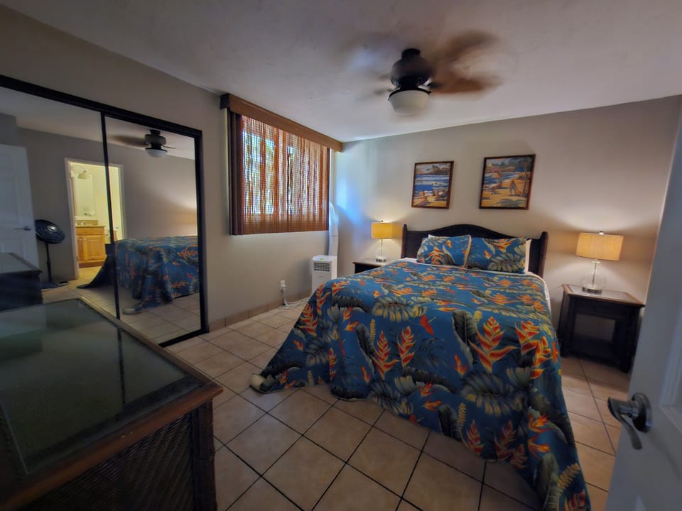 Cozy queen size room with AC to keep cool at night and a full private bathroom.
