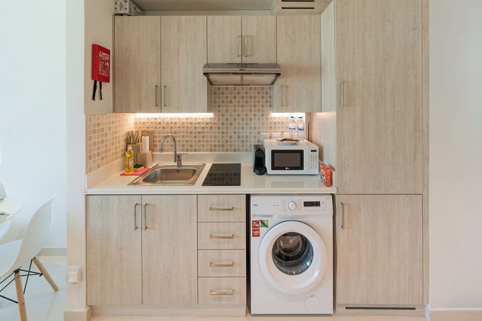 Equipped kitchen, Fridge, microwave, Nespresso and private laundry.