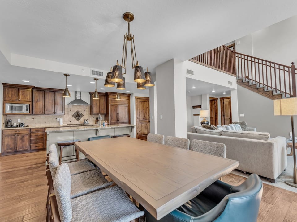 Dining area: Main floor, table seating for 8, bar seating for 3, private patio access