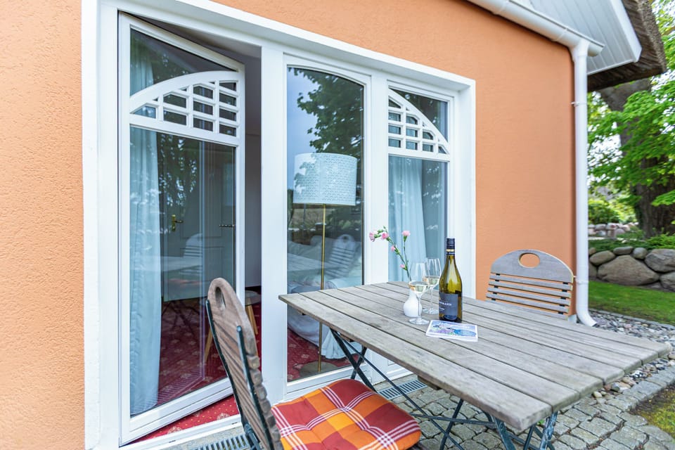 Cozy terrace with table and chairs