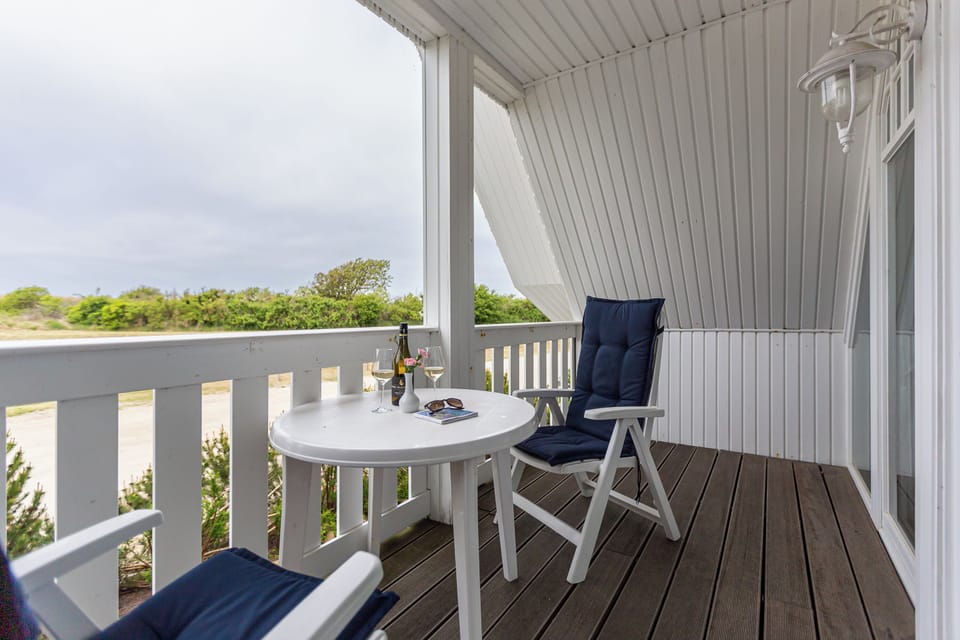 Cozy Terrace with Table and Chairs