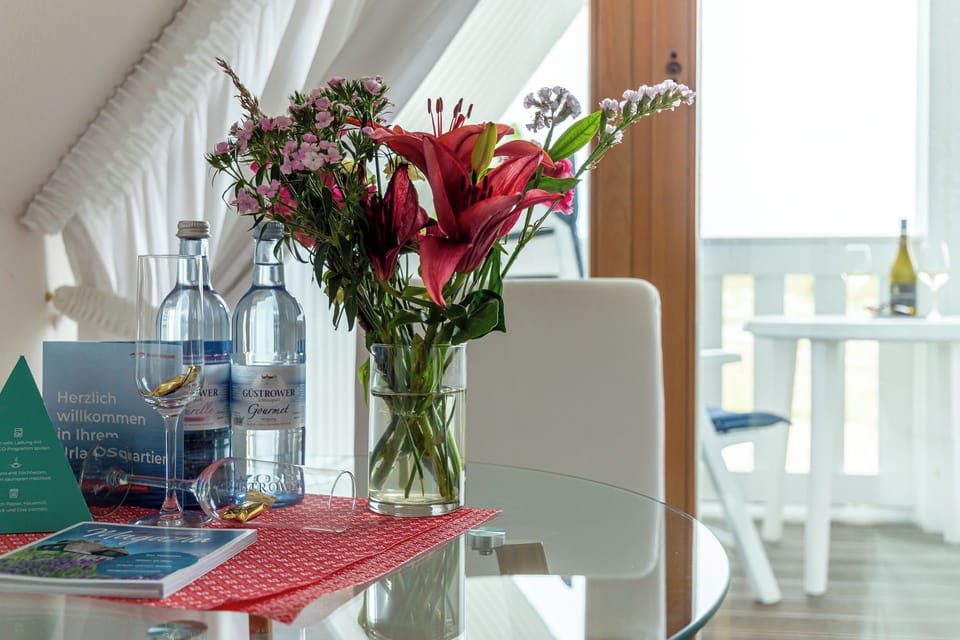 Bright Living Room with Table and Flowers