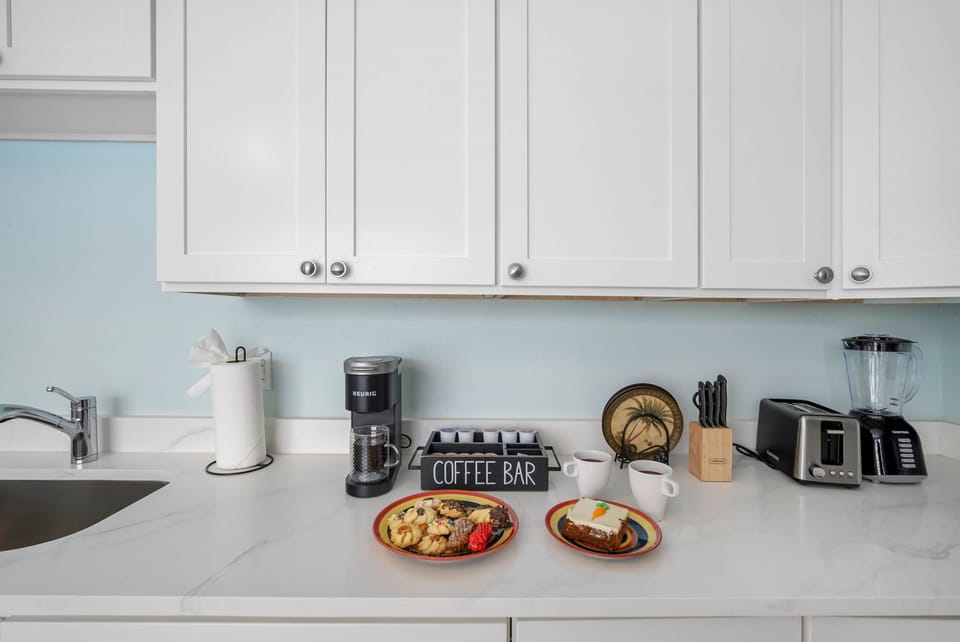 This kitchen offers a cheerful and functional atmosphere whether you're preparing a full meal or just enjoying a morning coffee.