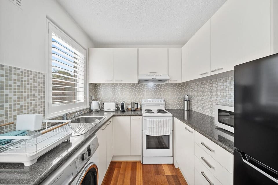 Fully equipped kitchen with ample space and modern appliances—perfect for your stay