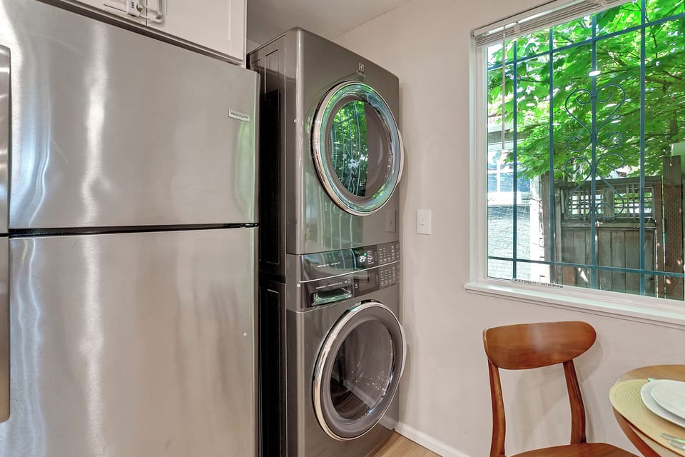 In-unit, high-efficiency washer and dryer available for guest use. 