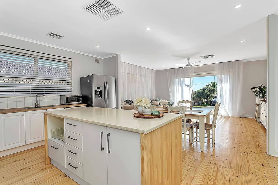 Prepare hearty meals in the fully equipped kitchen, complete with an oven, dishwasher, full-size fridge, espresso machine, and plenty of bench space for prepping local produce.