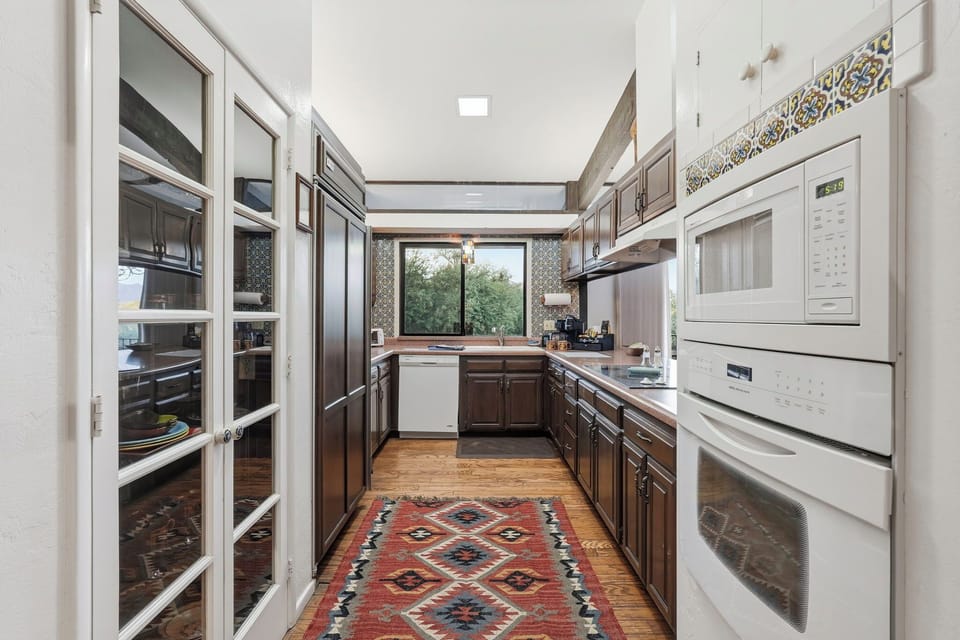 The spacious kitchen has all the comforts of home
