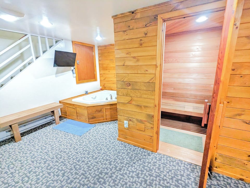 Spa-Like Retreat with Jacuzzi, TV & Sauna! 🧖