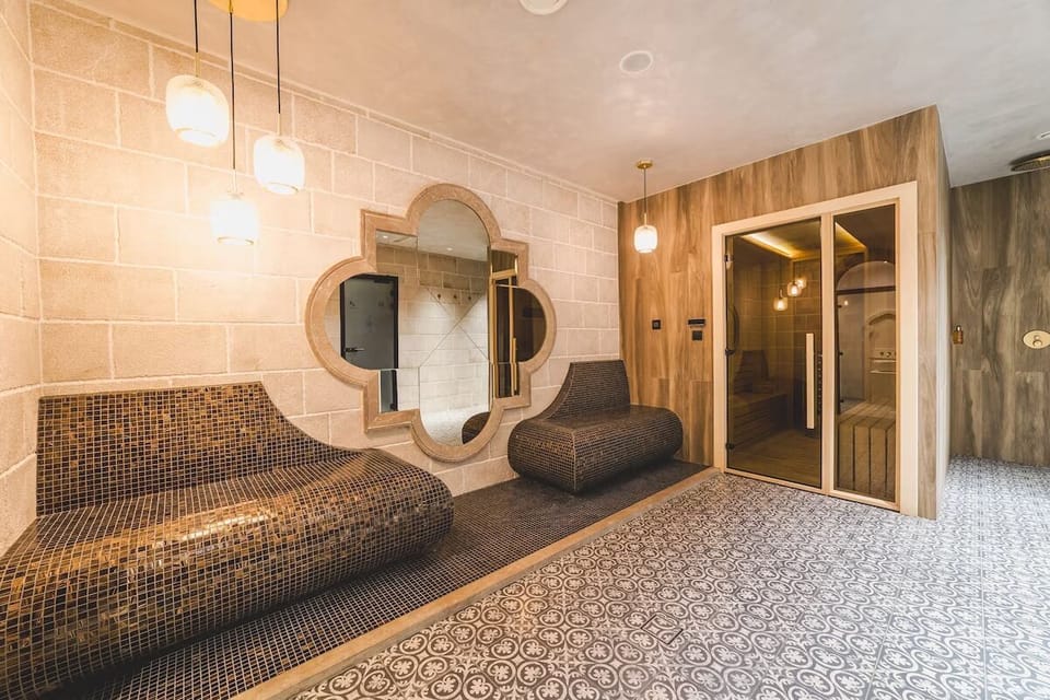 Sink into calm on heated loungers after a long day.