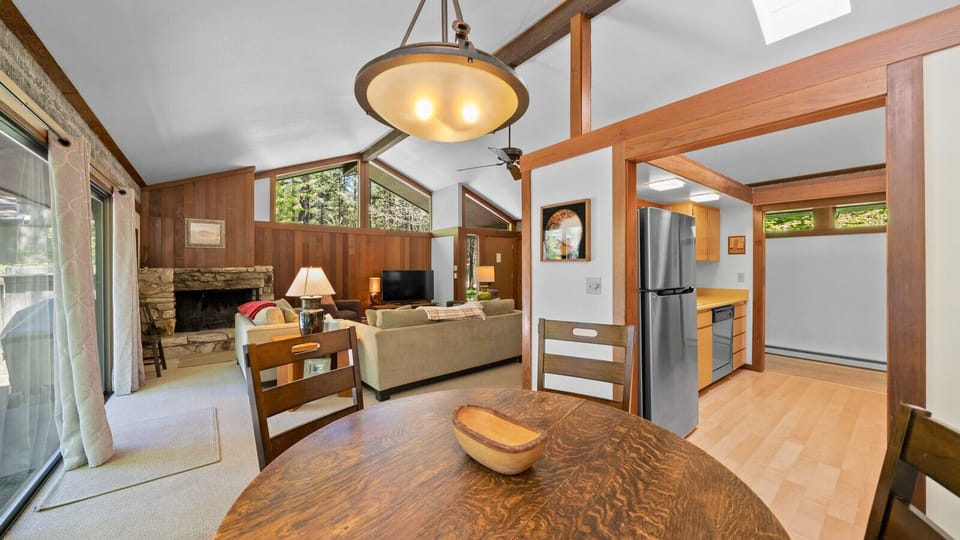 Dining area flows into open galley kitchen