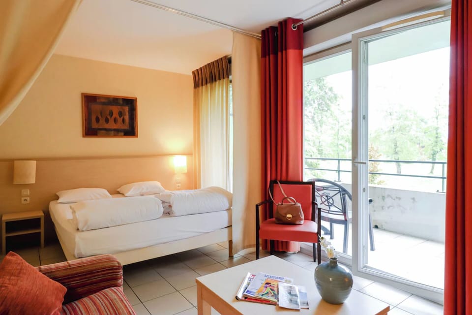 Step onto the balcony and breathe in fresh, leafy views.