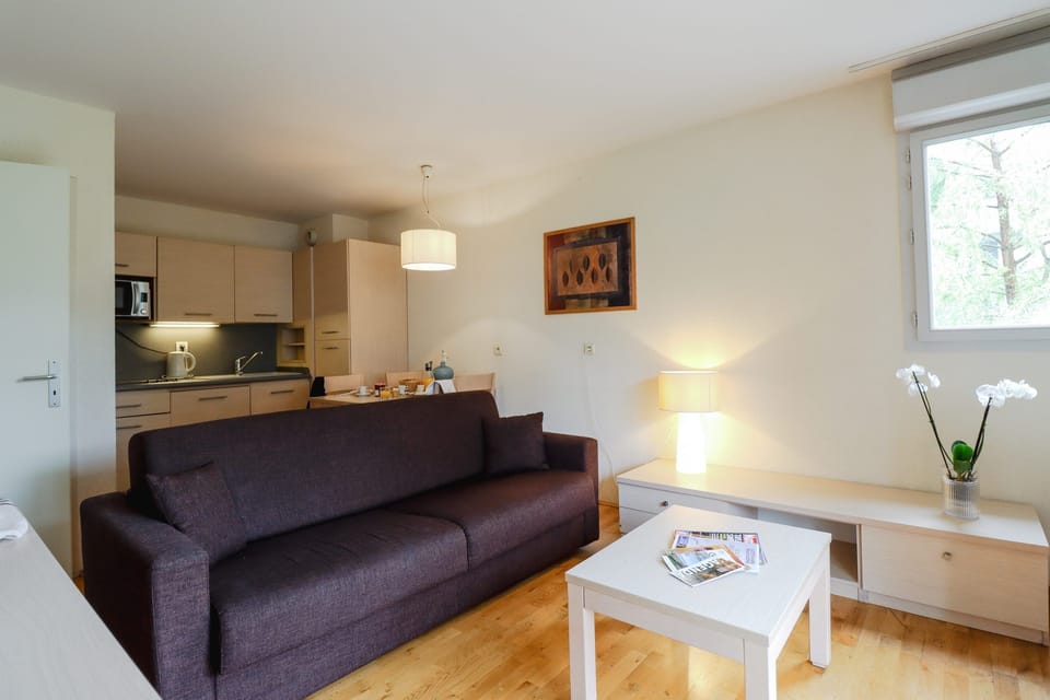 Settle into the cozy lounge steps from the kitchen.