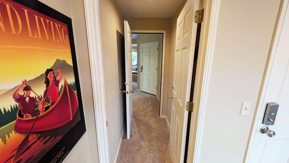 The Hallway to Bedroom 2 features double lock off doors for privacy
