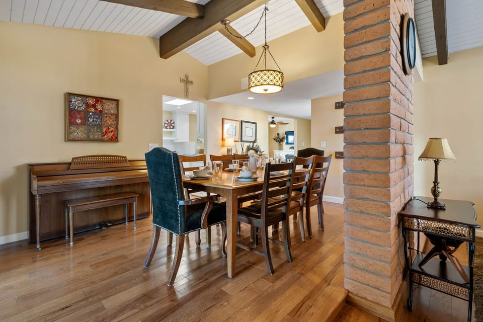Dining Area with Seating for 8 next to the Piano