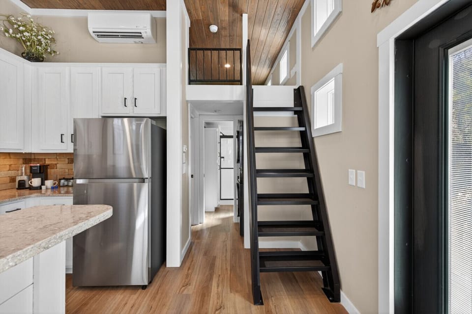 Loft access requires climbing stairs and may not be suitable for young children, elderly guests, or those with mobility or balance limitations. Please use caution when using the stairs and loft area.