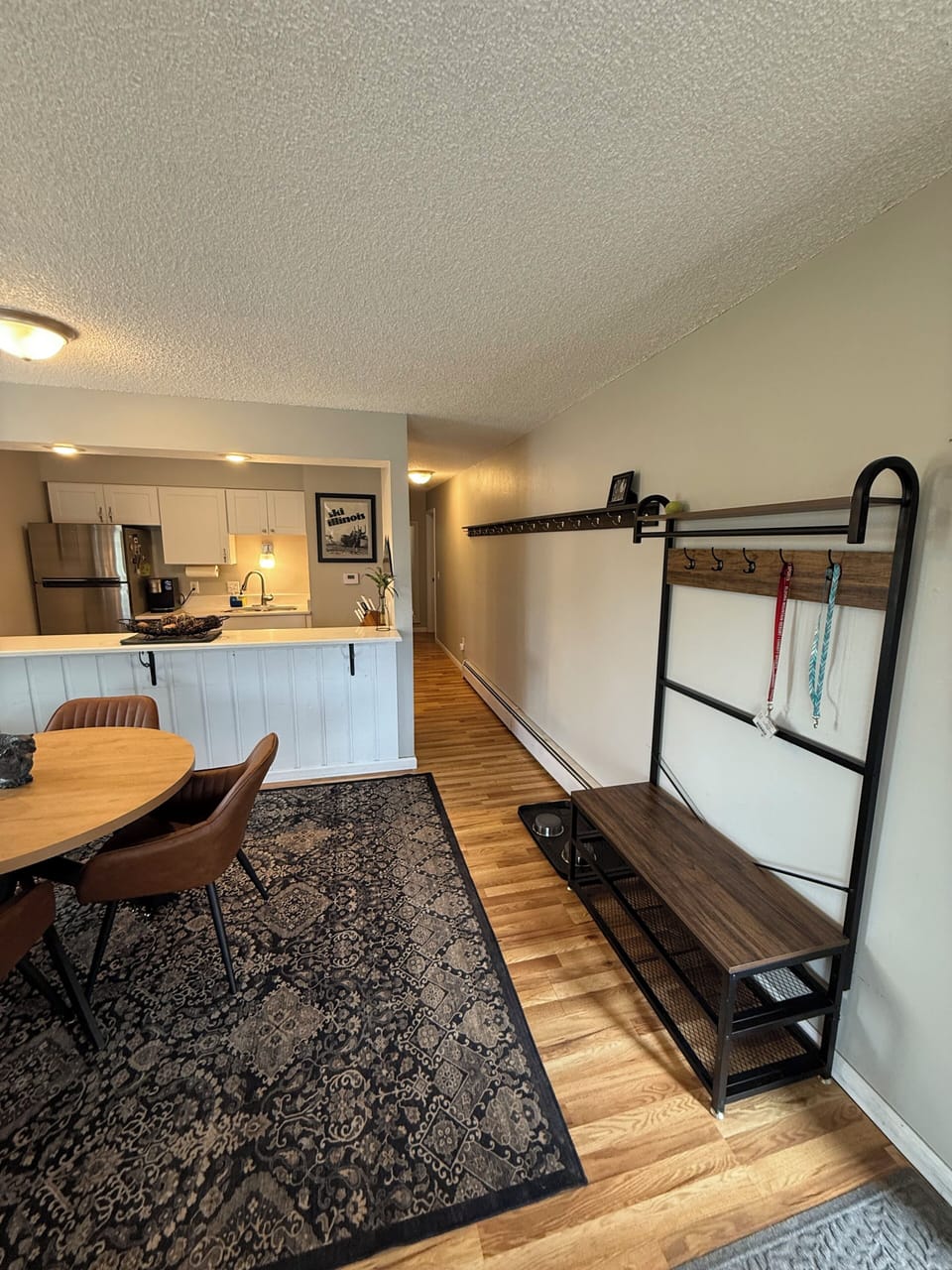 Hallway lined with hooks to keep your items tidy.