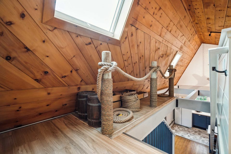 Loft with queen bed and desk