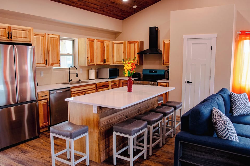 Large well equipped kitchen and sitting area