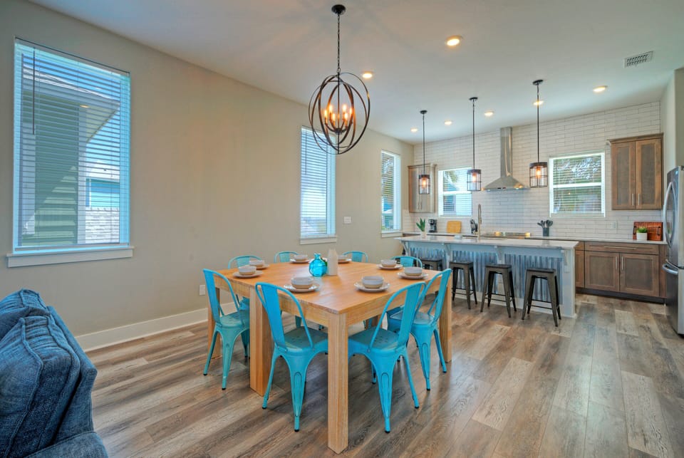 Dual dining tables can be joined to create one large communal table—perfect for group meals and gatherings.