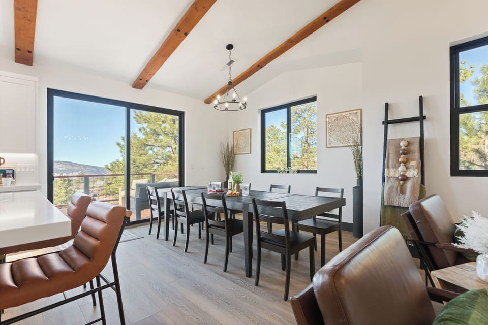 Natural wood tones highlight this warm, welcoming dining room.