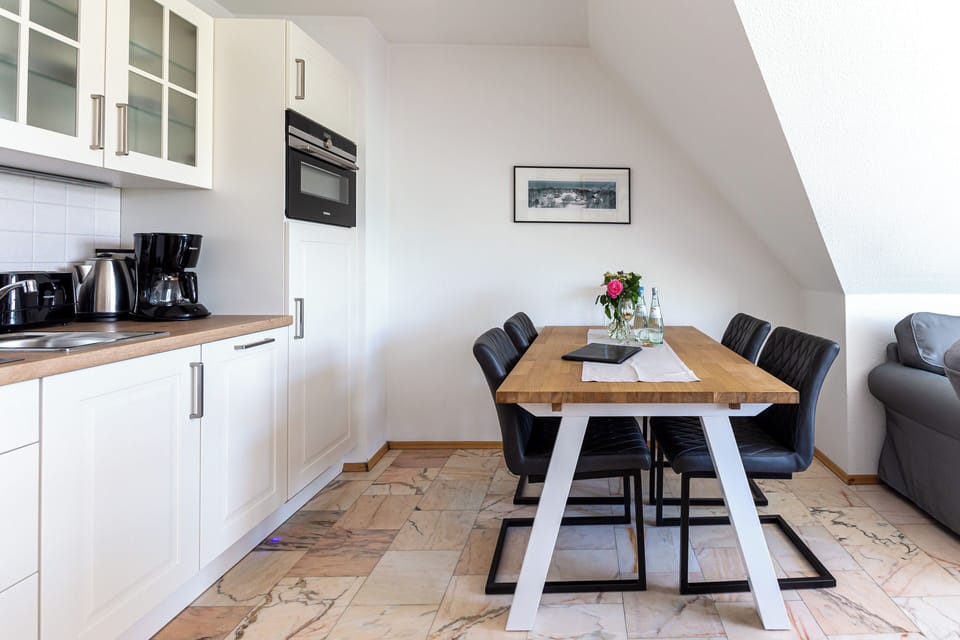 Modern Kitchen with Dining Table and Chairs