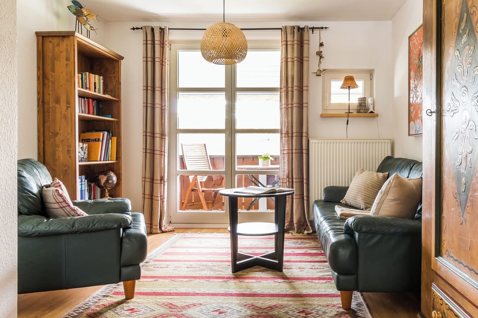 Cozy Living Room with Leather Sofas and Table.