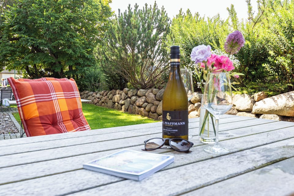 Terrace with Table, Wine, and Flowers