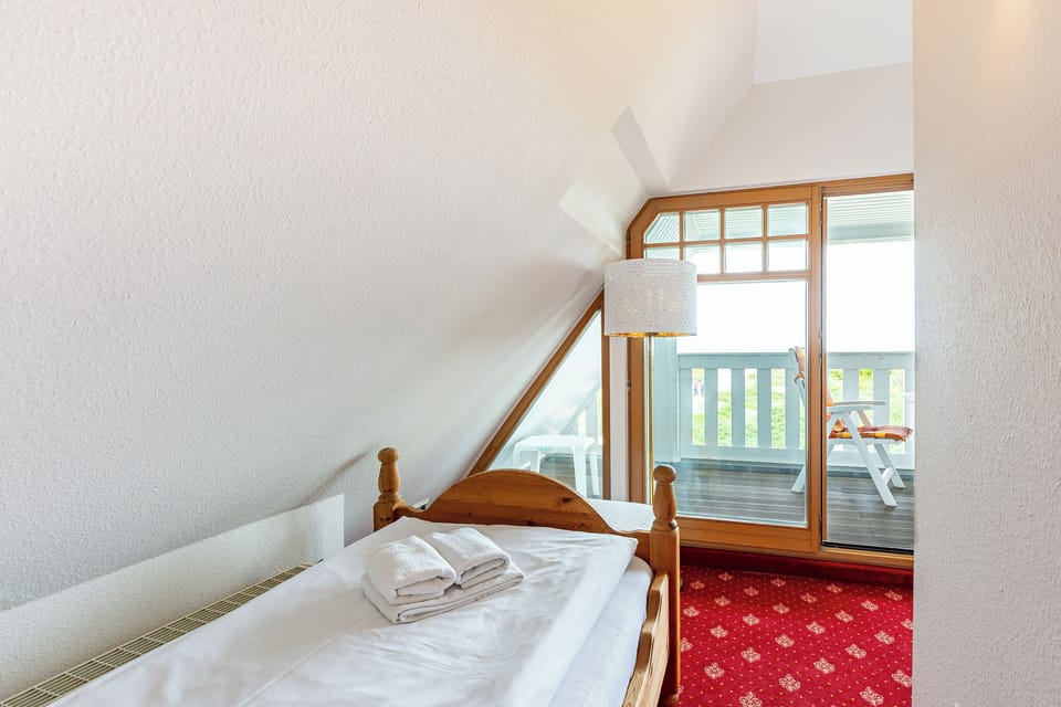 Bright Bedroom with Access to Balcony