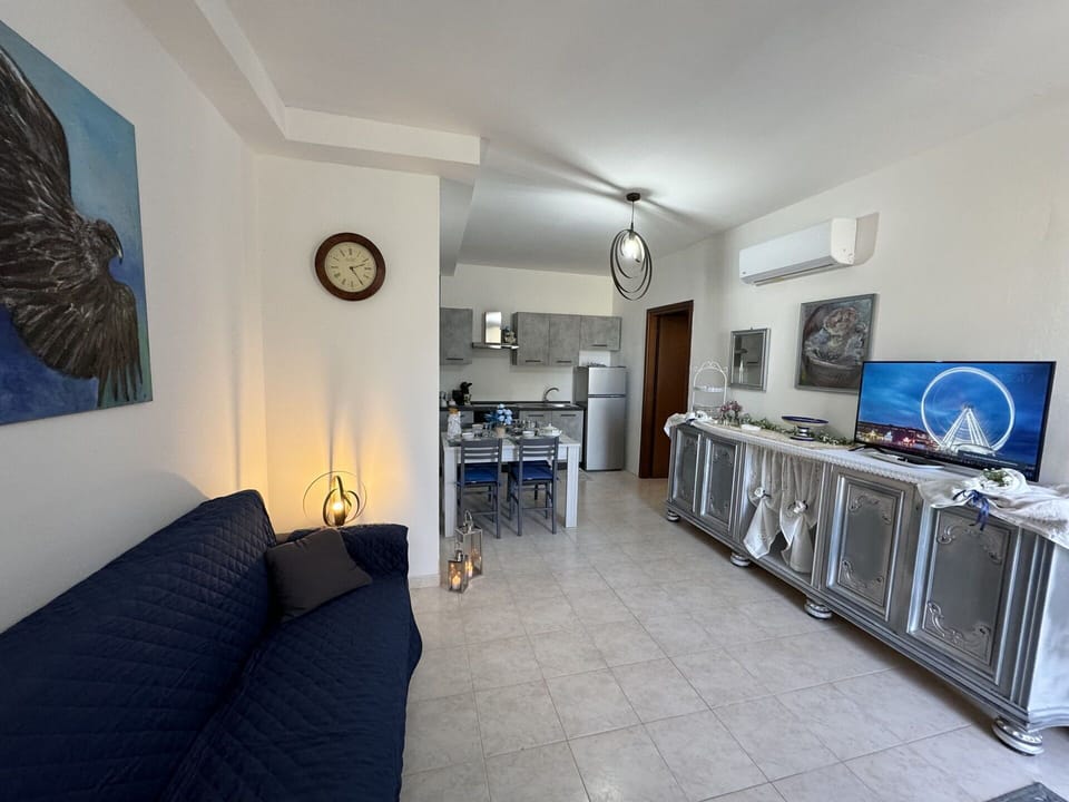 Furniture, Flooring, Floor, Apartment, Couch, Chair, Living Room, Coffee Table, Sofa Bed
