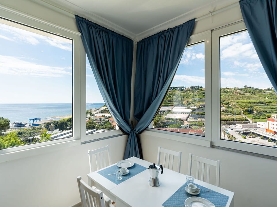 Furniture, Chair, Table, Outdoor Furniture, Outdoor Table, Porch, Kitchen & Dining Room Table, Balcony, Deck, Shade