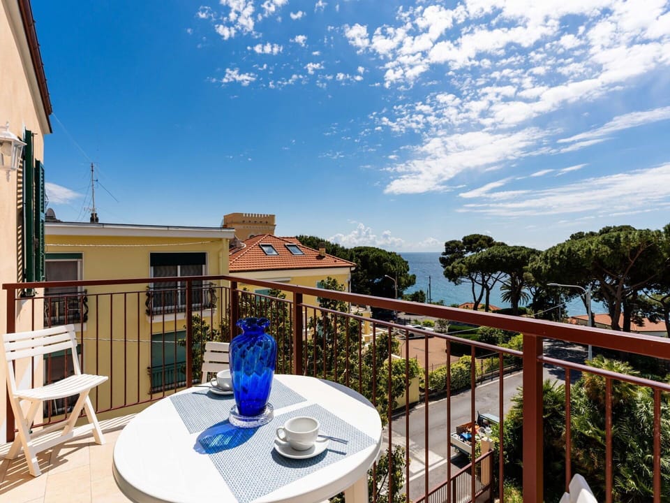 Furniture, Chair, Table, Outdoor Furniture, Outdoor Table, Porch, Kitchen & Dining Room Table, Balcony, Deck, Shade