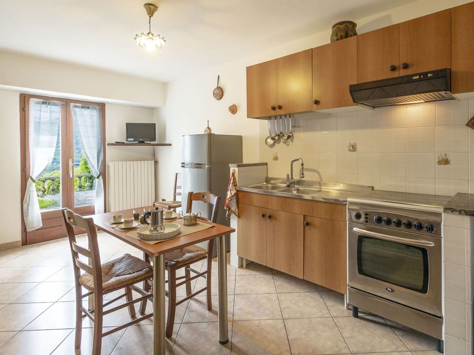 Furniture, Chair, Table, Outdoor Furniture, Outdoor Table, Porch, Kitchen & Dining Room Table, Balcony, Deck, Shade