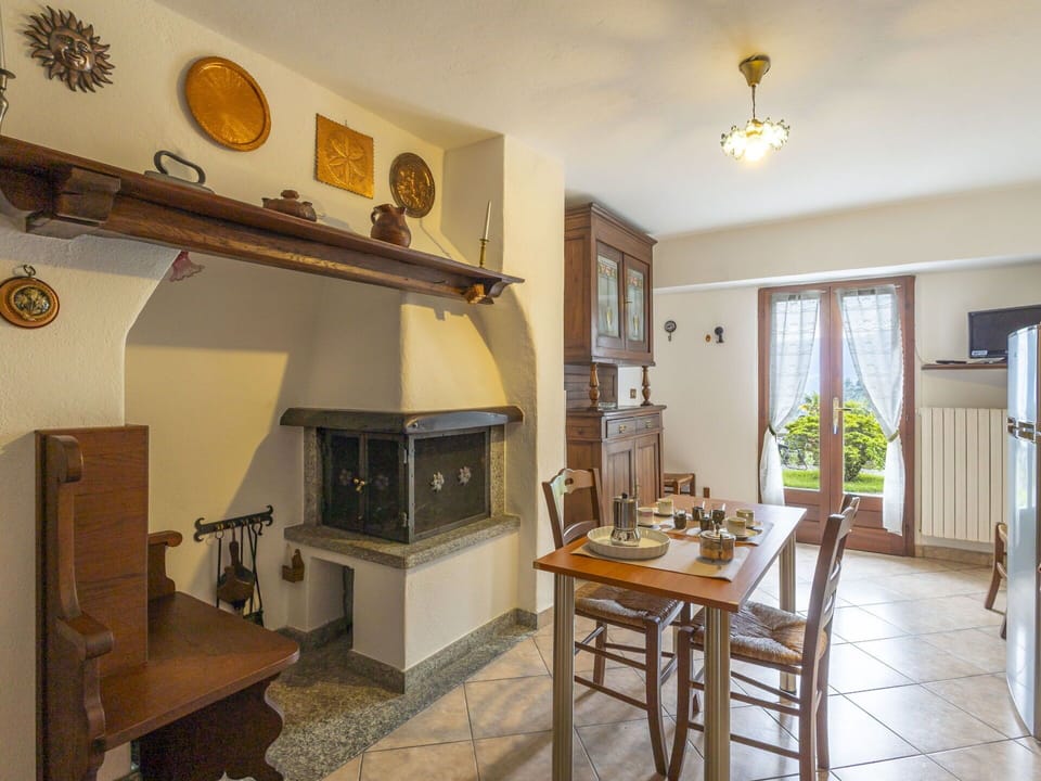 Furniture, Chair, Table, Outdoor Furniture, Outdoor Table, Porch, Kitchen & Dining Room Table, Balcony, Deck, Shade