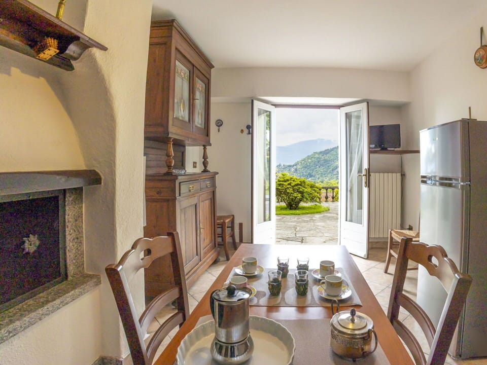 Furniture, Chair, Table, Outdoor Furniture, Outdoor Table, Porch, Kitchen & Dining Room Table, Balcony, Deck, Shade