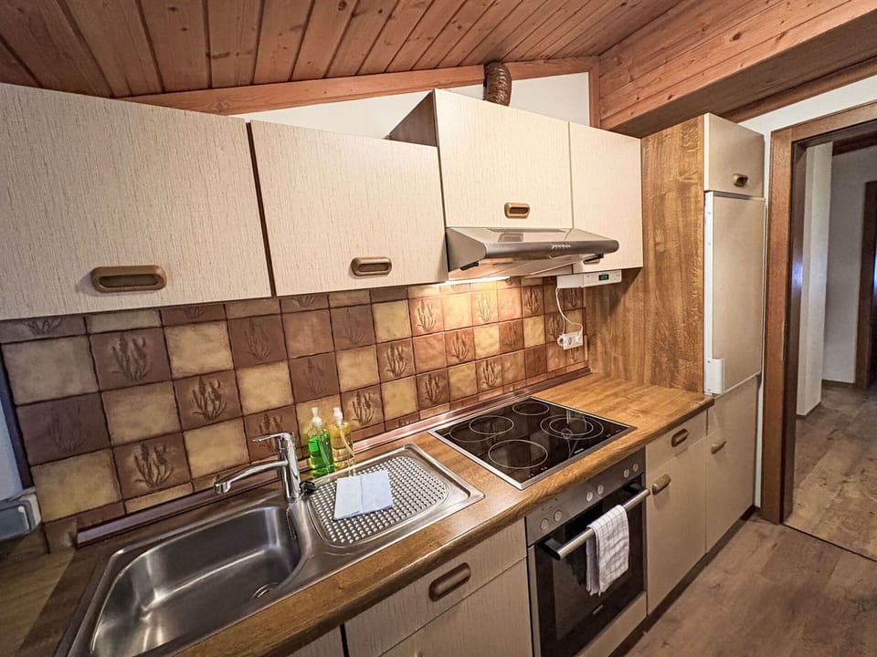 Wood, Kitchen, Countertop, Major Appliance, Cabinetry, Interior Design, Kitchen Appliance, Flooring, Floor, Ceiling