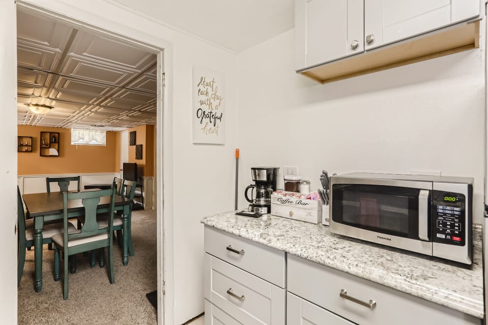 The kitchen area features everything you need for an extended stay