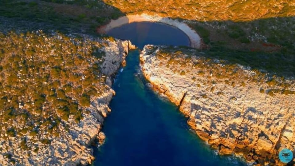 The Lake of the Pope - Twin beach of Voidokoilia with brown waters awaits for you to explore (4km)