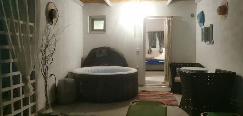 Comfortable outdoor seating nook – perfect for evening chats.