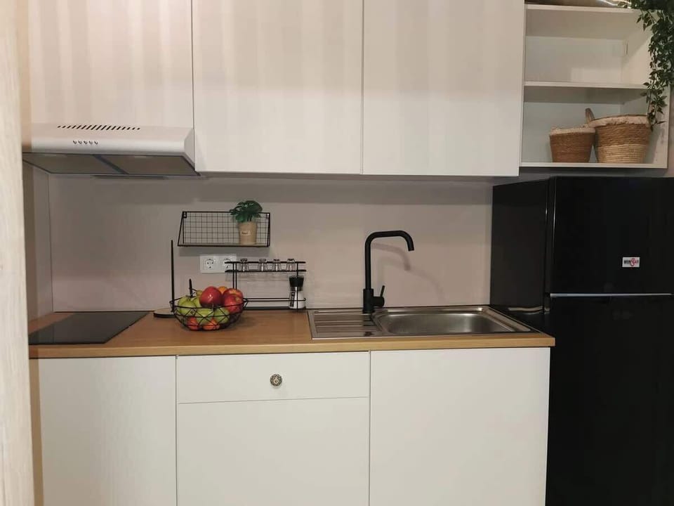 Fully equipped kitchen with all essentials for your stay.