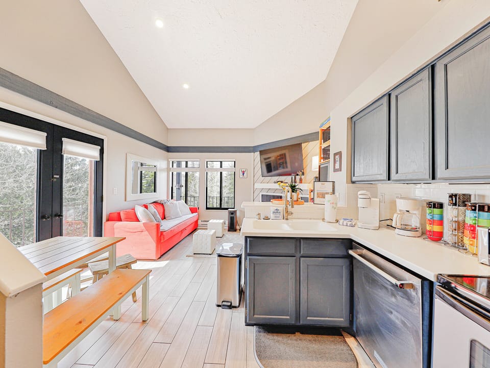 View from the kitchen to the open concept layout of Timberbrook Corner Loft