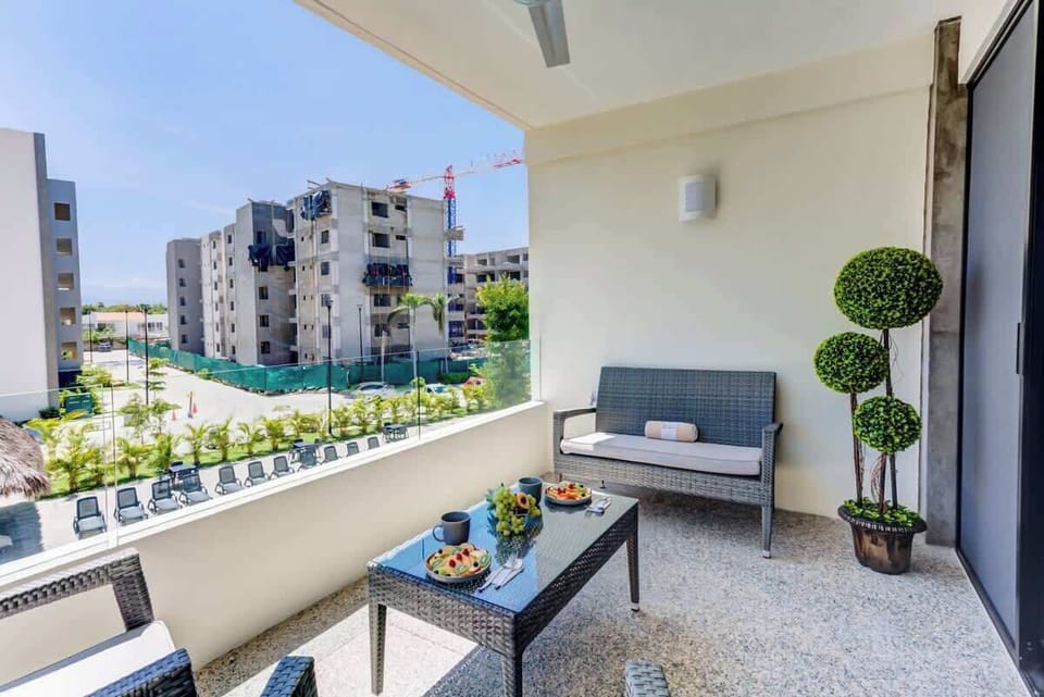 Private balcony w/ seating area, perfect for morning coffee or evening unwind