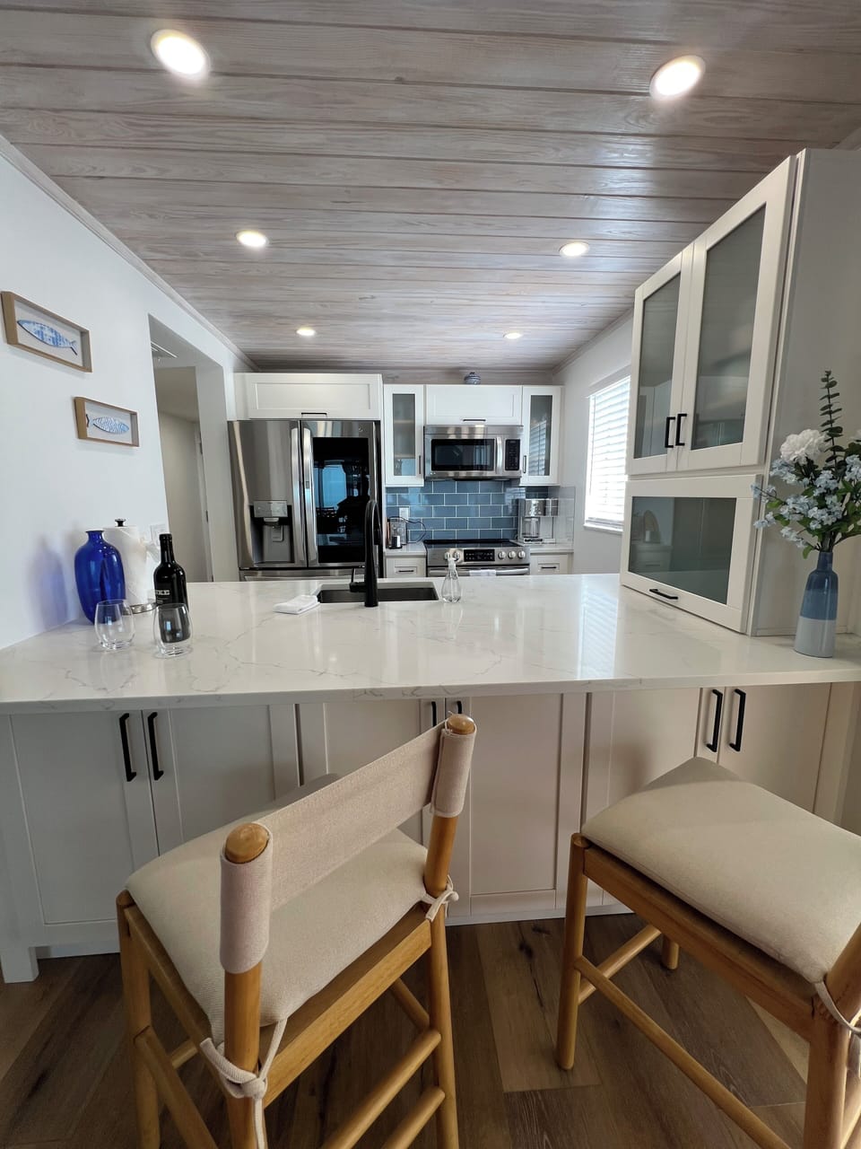 Kitchen with two bar stools