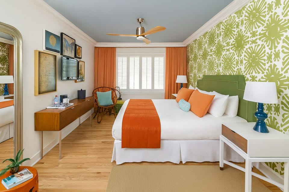 Relax in a stylish retreat with bold accents and warm lamps.
