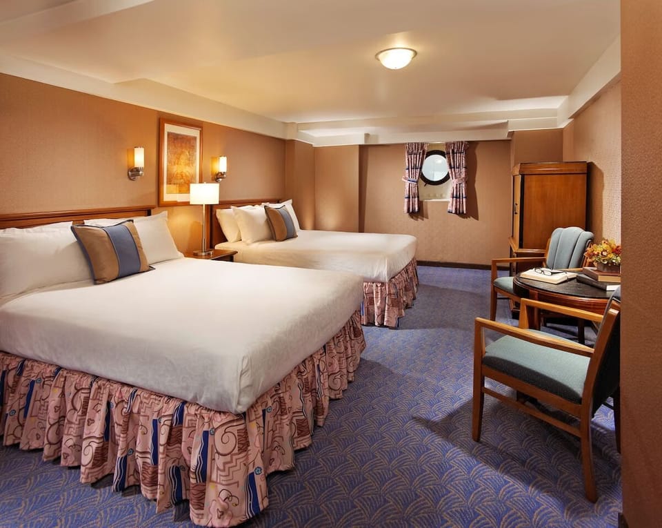 Enjoy extra space with two beds and a lounging corner.