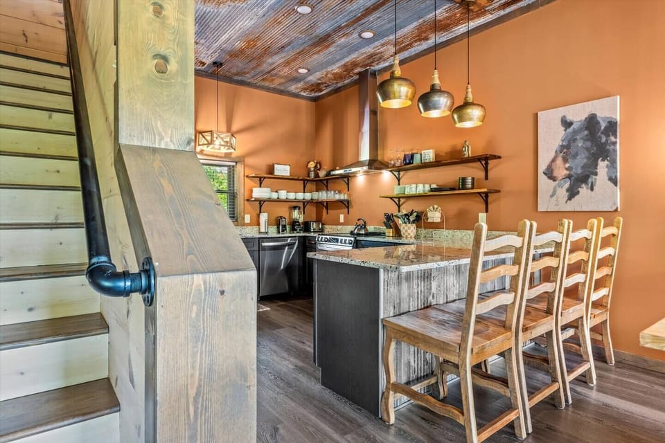 Fully-stocked kitchen with bar seating 