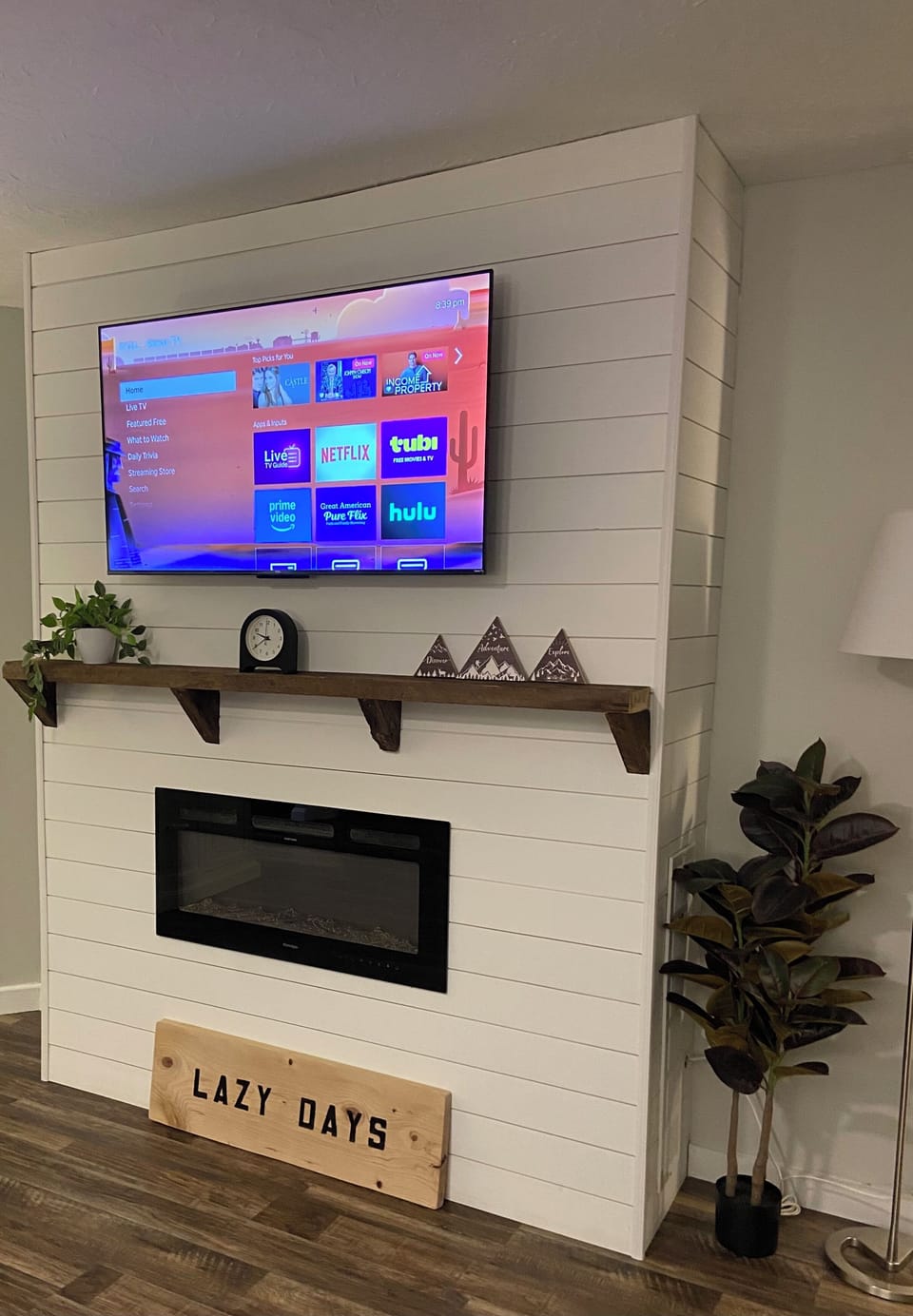 Living Room mantle. Electric Fireplace. Smart TV 